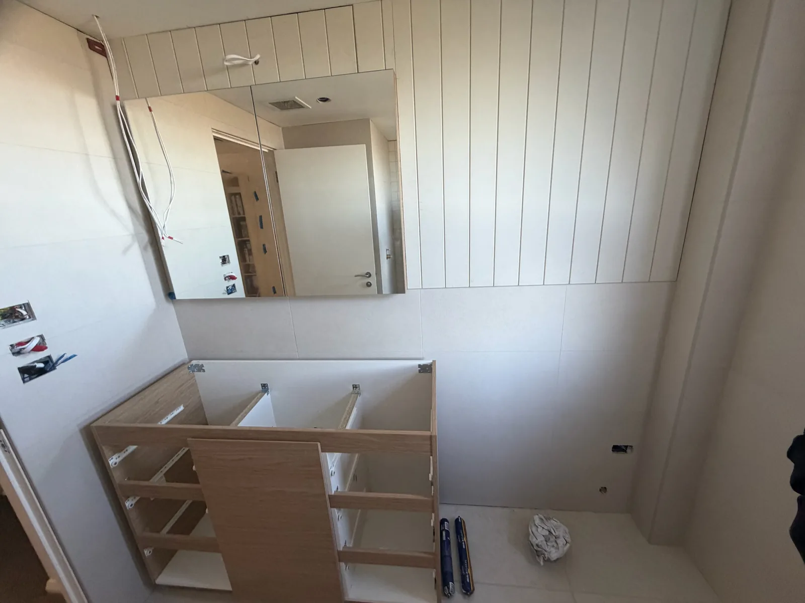 Custom timber cabinetry being fitted on site by Zak's Building Solutions