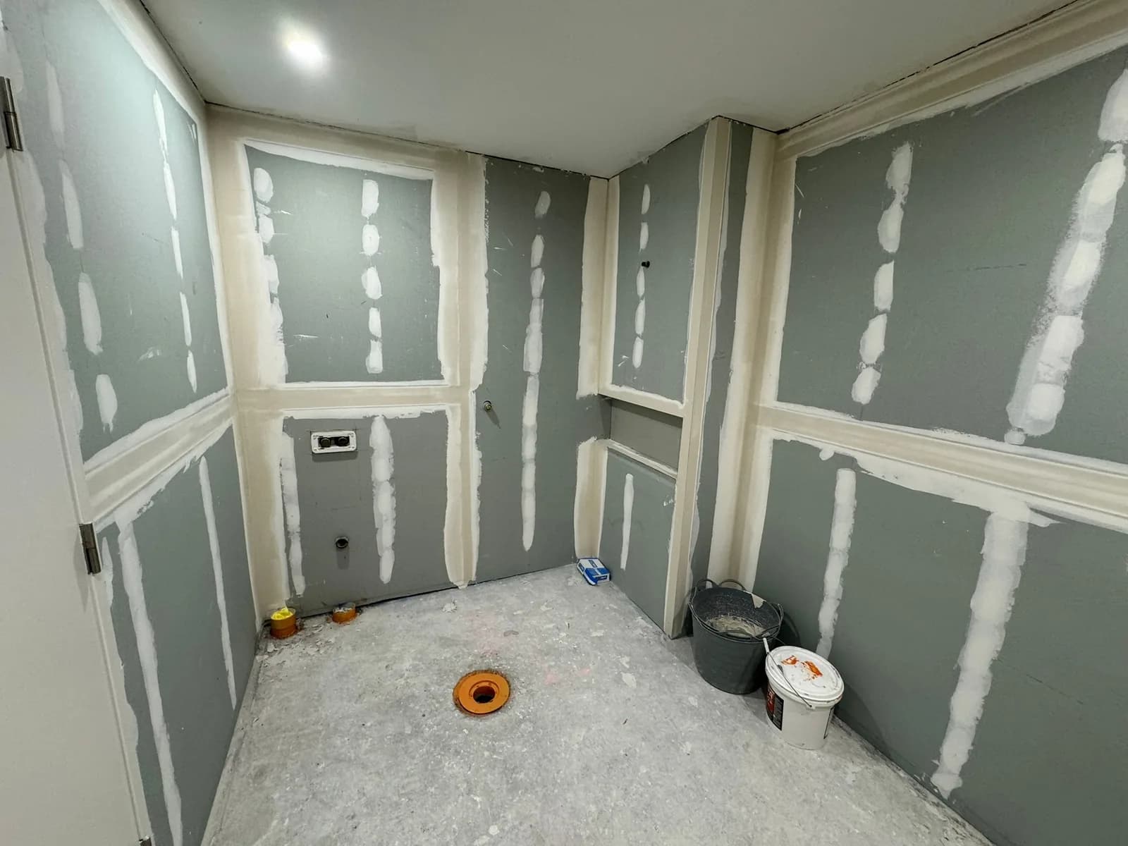 New wall linings installed and set, ready for waterproofing